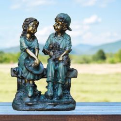 Alpine Corporation 16" Tall Indoor/Outdoor Girl and Boy Sitting on Bench with Puppy Statue Yard Art Decoration