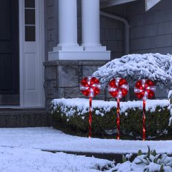 Alpine Corporation 28"H Outdoor Candy Cane Yard Stakes with Red and White LED Lights (Set of 3)