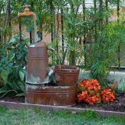 Rustic Invisible Flowing Spout Watering Can Fountain