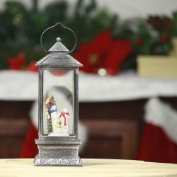 Alpine Corporation 11"H Indoor Lantern Snowman Snow Globe Holiday Decoration with LED Light, Silver