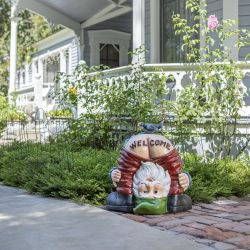 Alpine Corporation 22" Tall Mooning "Welcome" Outdoor Garden Gnome with Bird Yard Statue Decoration